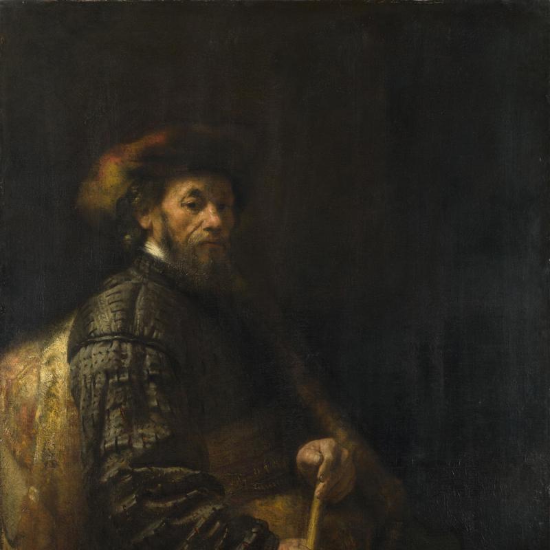 A Seated Man with a Stick